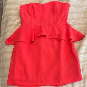 Strapless coral Peplum Dress